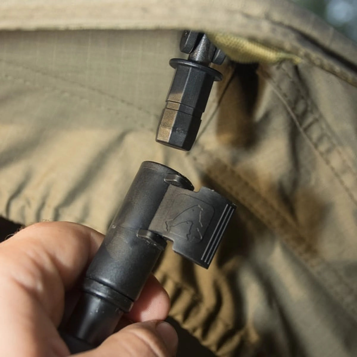 Avid Quick Click Adaptor tijdens het loskoppelen