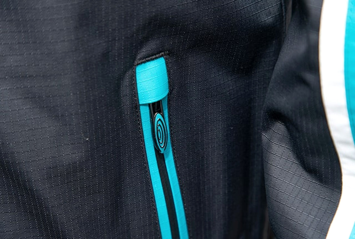 Drennan 25K WP Jacket: zakrits met turquoise bovenlip en omlijsting in het zwarte ripstopmateriaal