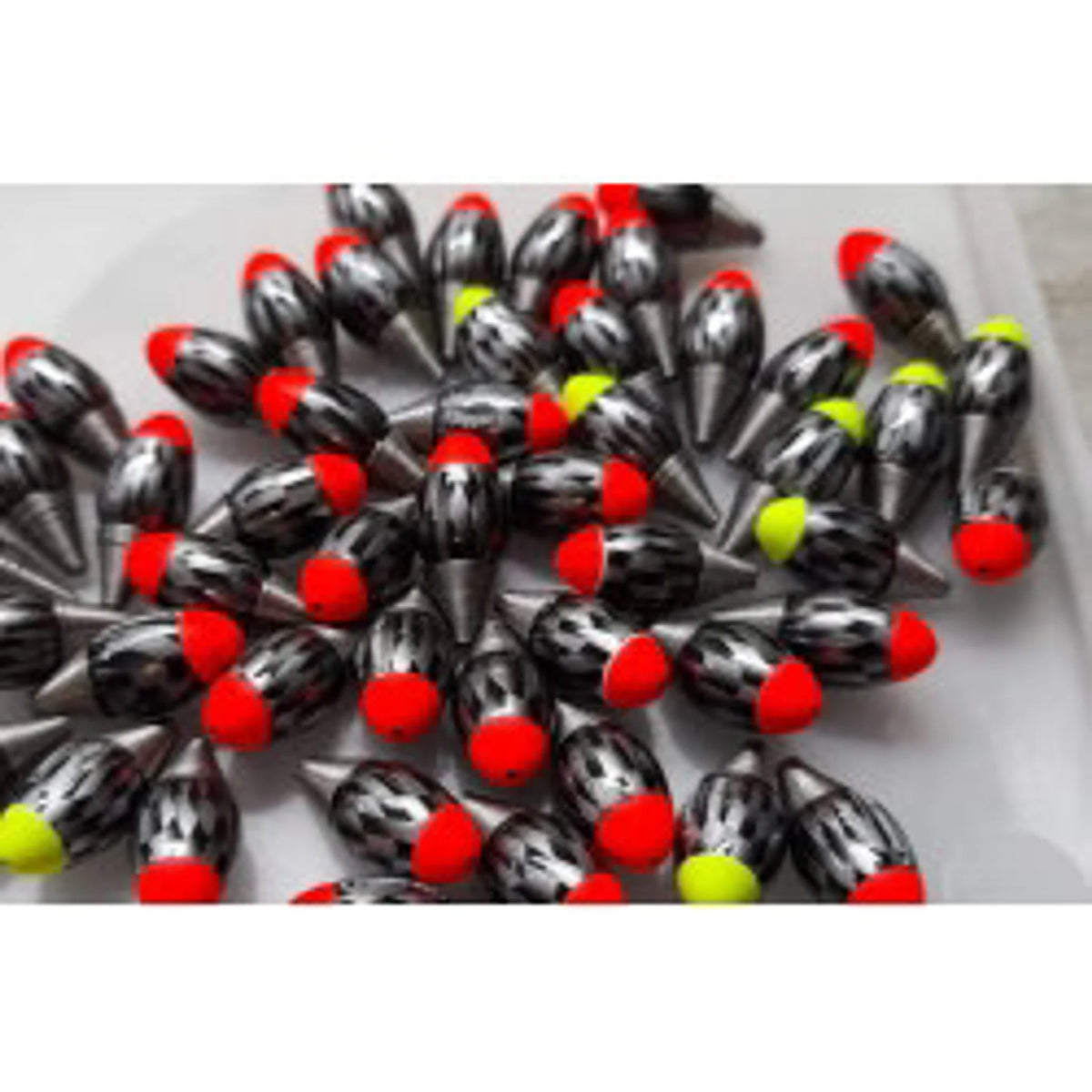 Fun Fishing Jigger 2 dobbers met rode en gele toppen in een bakje