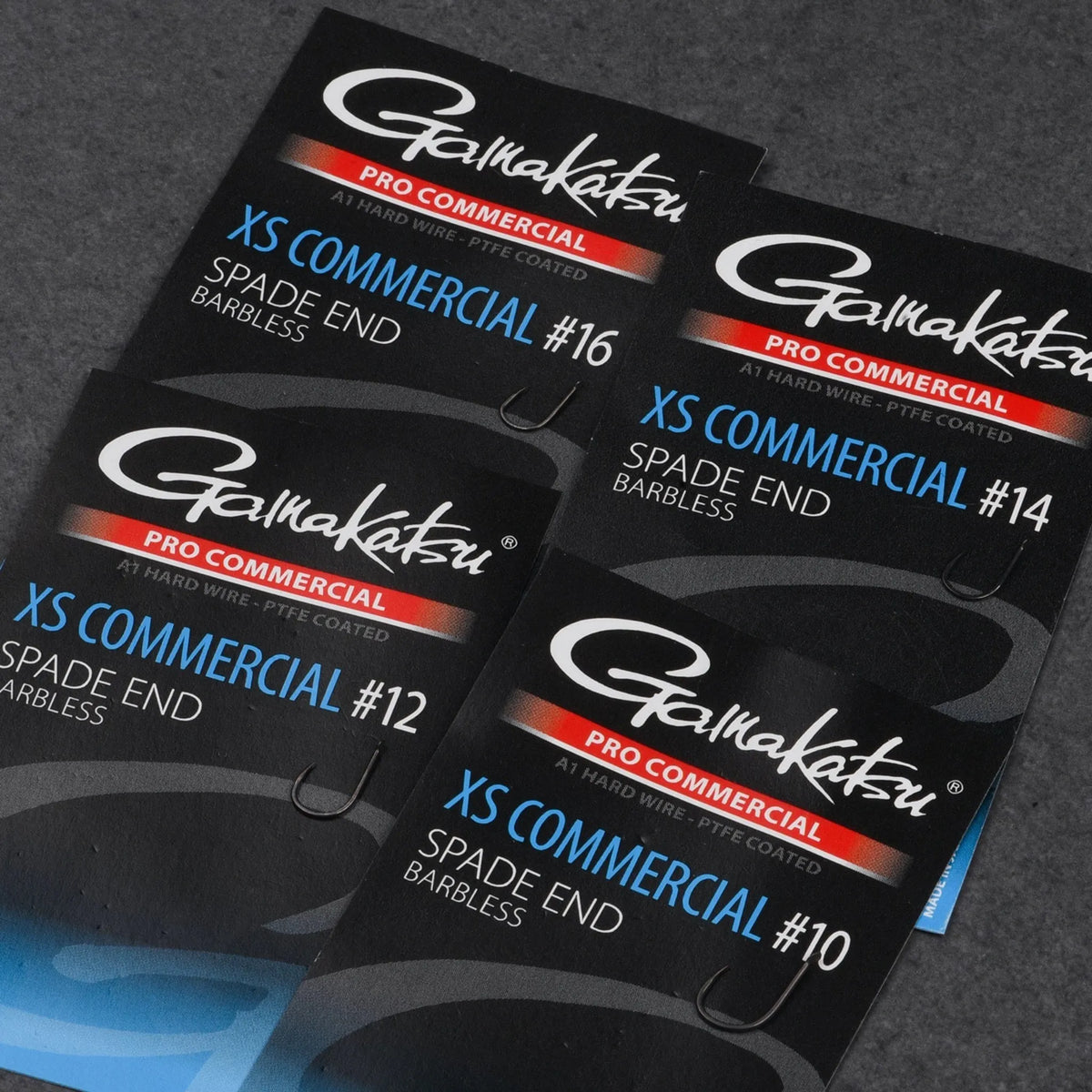 Gamakatsu Pro Commercial XS Commercial Spade End Barbless – verpakking met weerhaakloze bledhaken en beschikbare maten