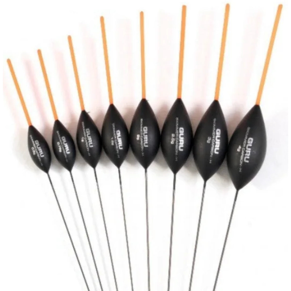 Guru Skimmer Hollow Carbon – reeks dobbers met oranje holle antennes en zwarte lichamen