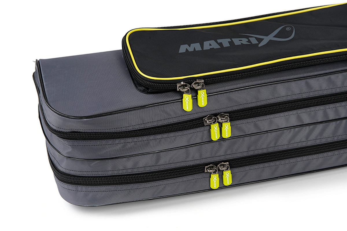Matrix Ethos Rigid Holdall – bovenzijde met twee lange hoofdritsen, gele ritstrekkers en zwart Matrix-buitenvak