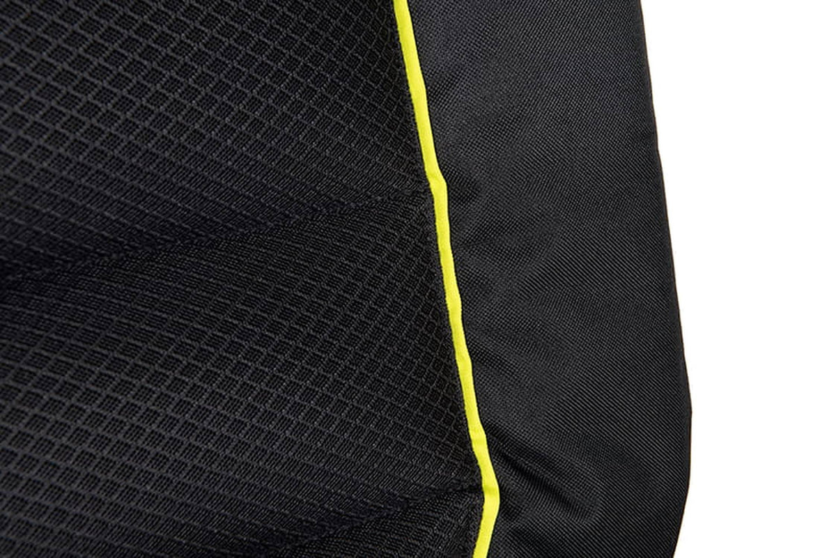 Zwarte bekleding met structuurpatroon en gele bies van de Matrix S25 Pro Accessory Chair