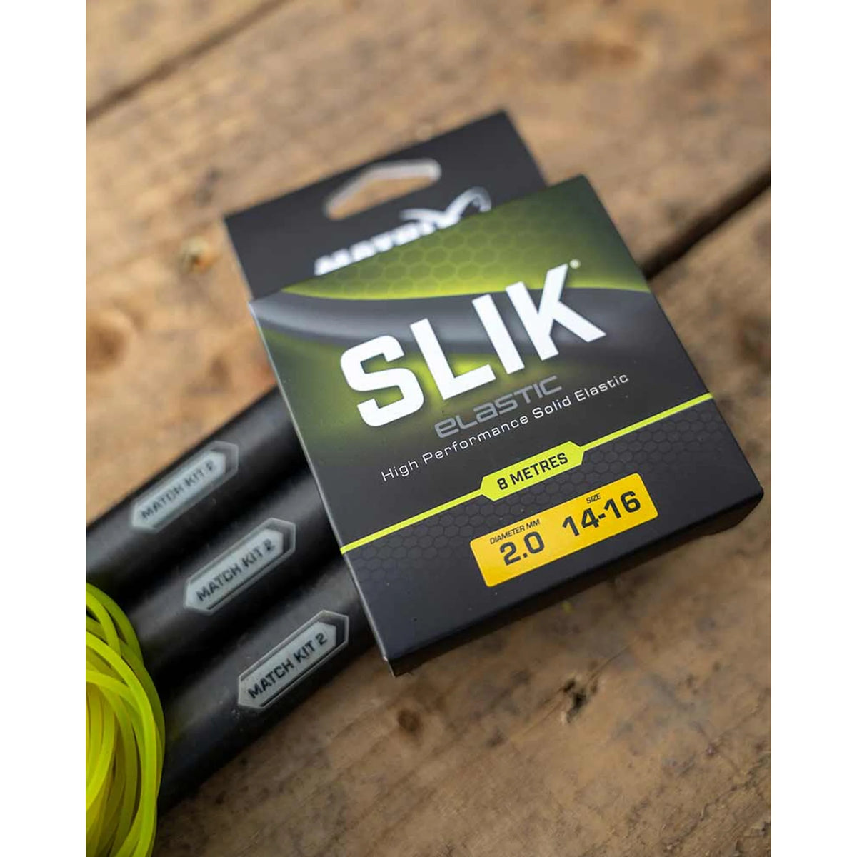 Matrix SLIK Elastic 8 m – assortiment en verpakking op houten tafel