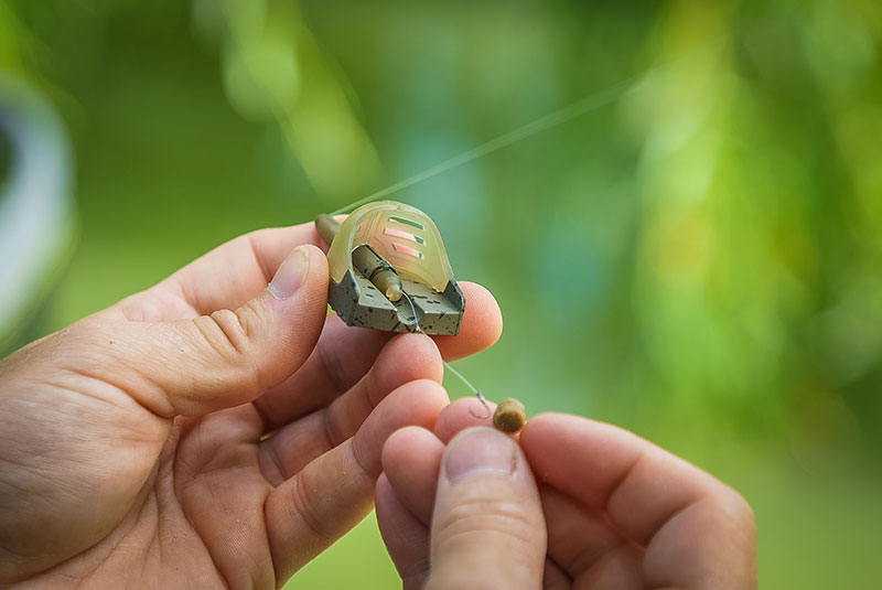 Matrix inline pellet feeders