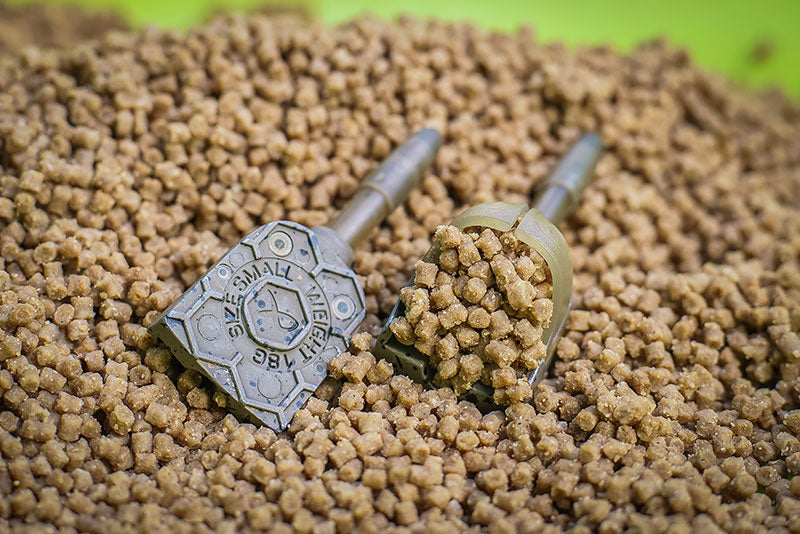 Matrix inline pellet feeders