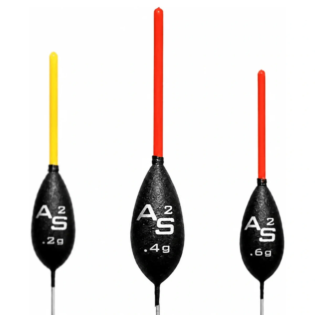 Drie zwarte Drennan AS2 dobbers met rode en gele antennes en opdruk .2 g, .4 g en .6 g