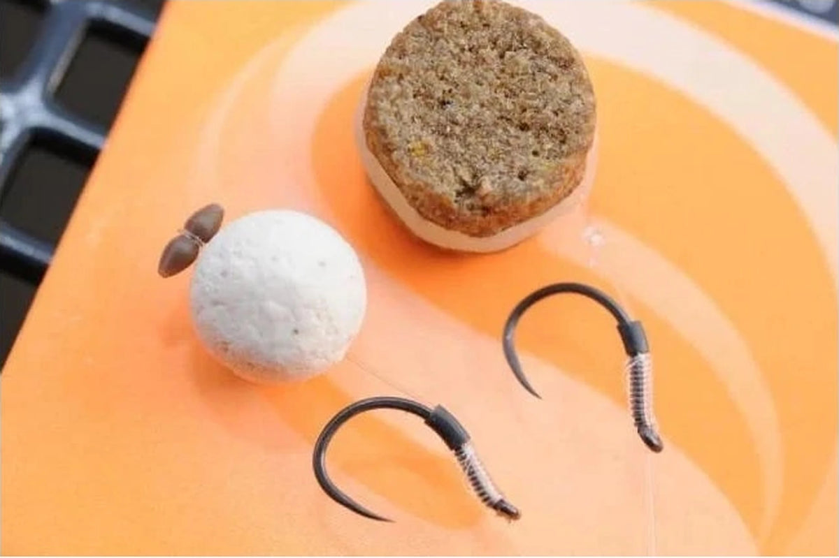 Guru QM1 Barbless-haak met pellets op een hair rig