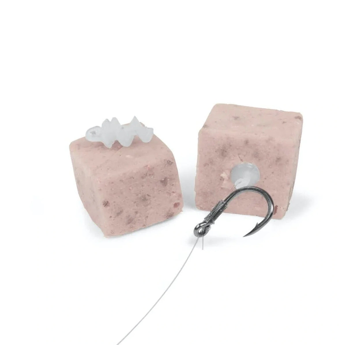 Korum Meat Screws Clear op twee stukken vlees, met haak en lijn