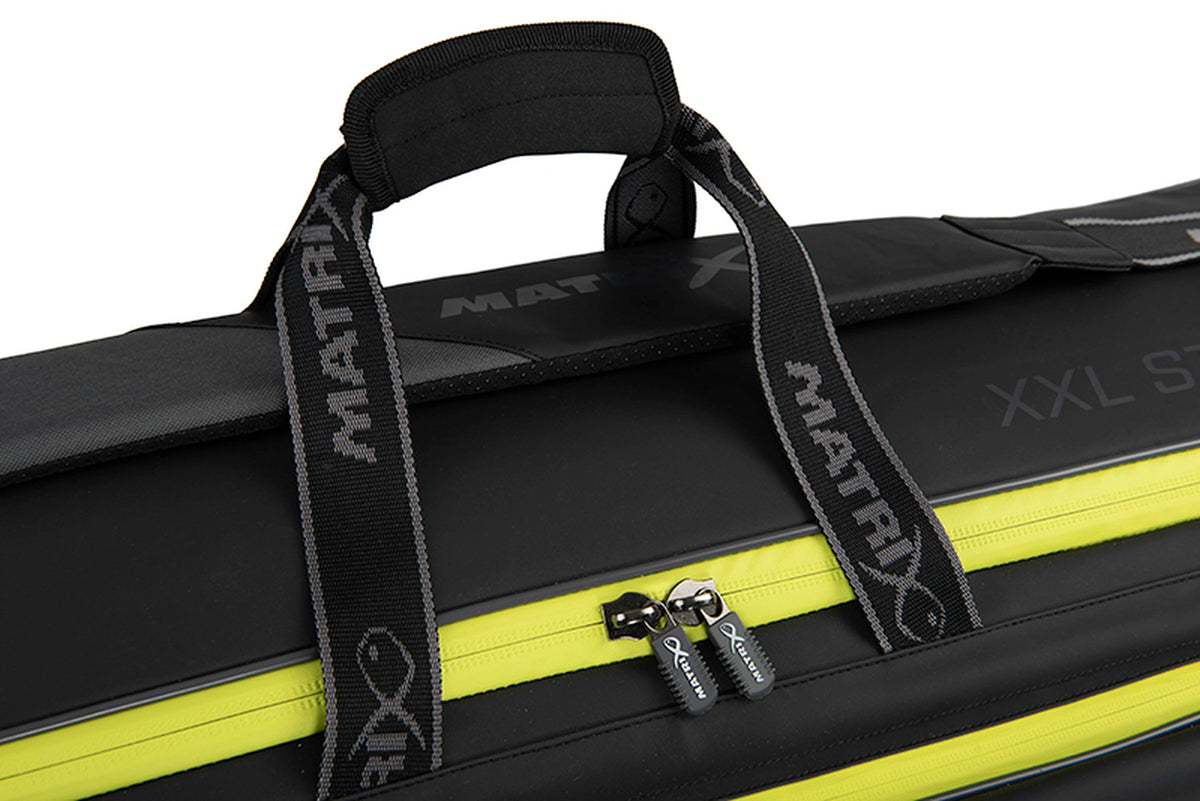 Matrix Horizon X XXL Storage Bag – detail van de gevoerde handgreep, Matrix-draagriemen en ritstrekkers