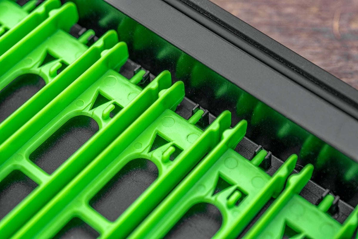 Visser gebruikt groene Preston InterLok Slider Winders in een open winder tray
