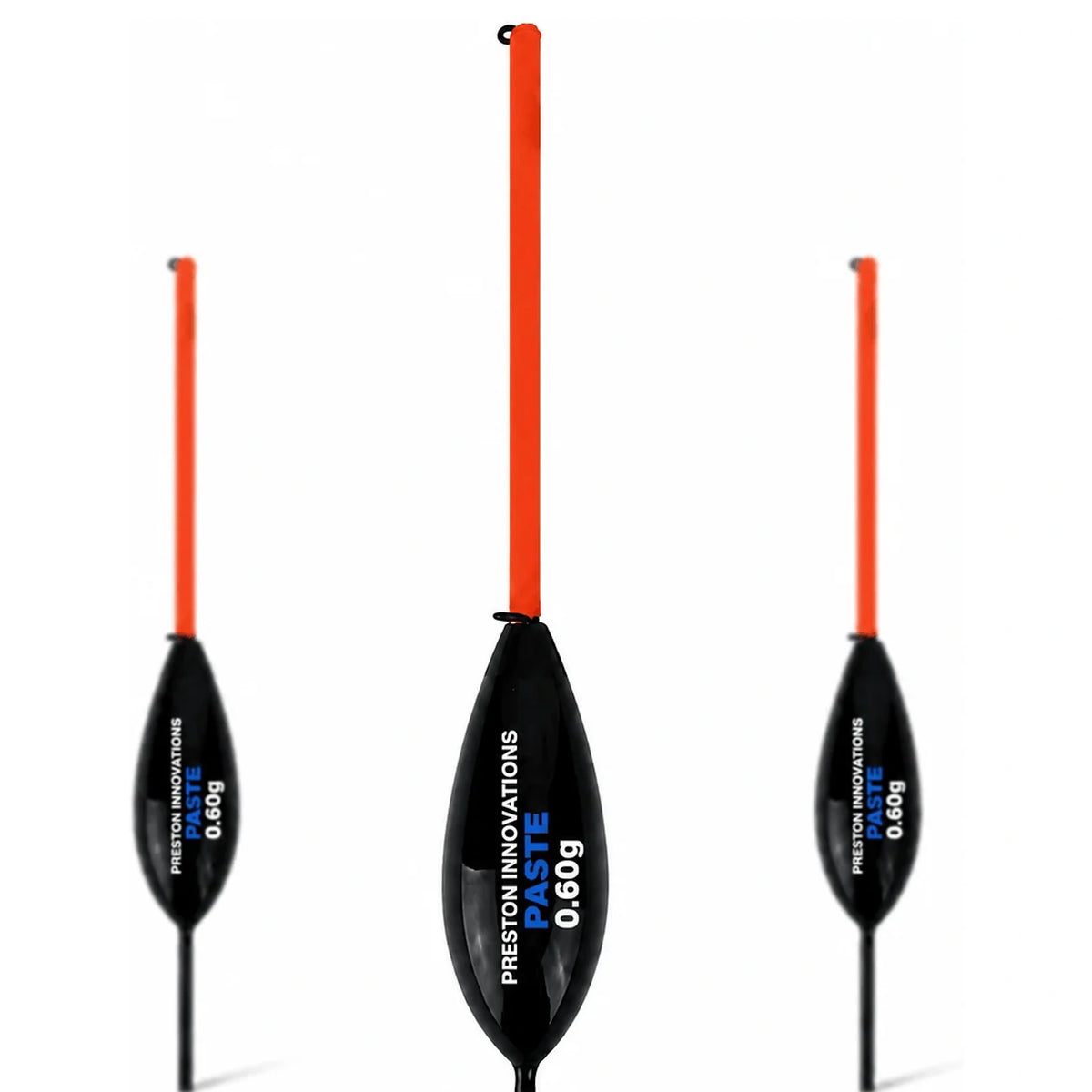 Drie Preston Paste dobbers met zwarte lichamen en lange oranje antennes