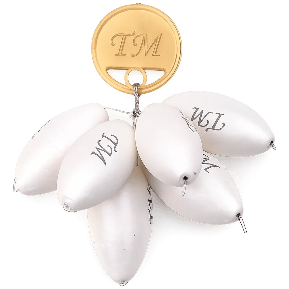 Zes witte ovale pilotdobbers met metalen oogjes en grijze TM-opdruk, bij een ronde goudkleurige TM-schijf.