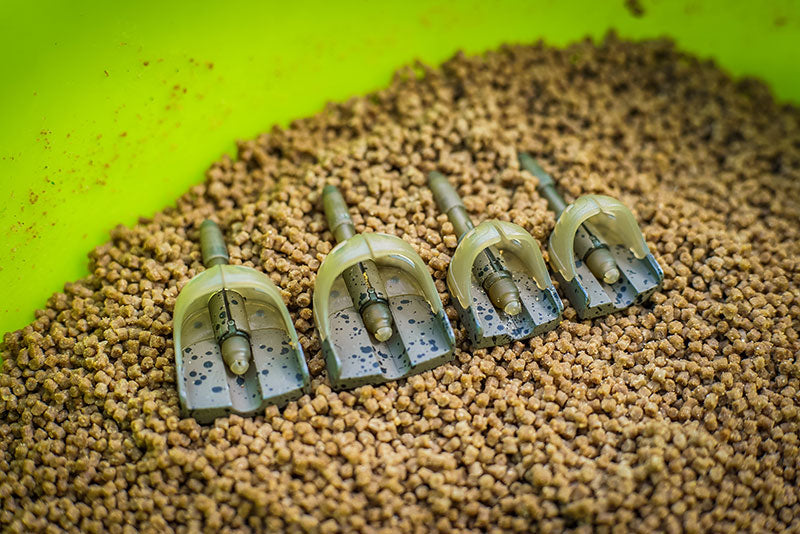 Matrix inline pellet feeders
